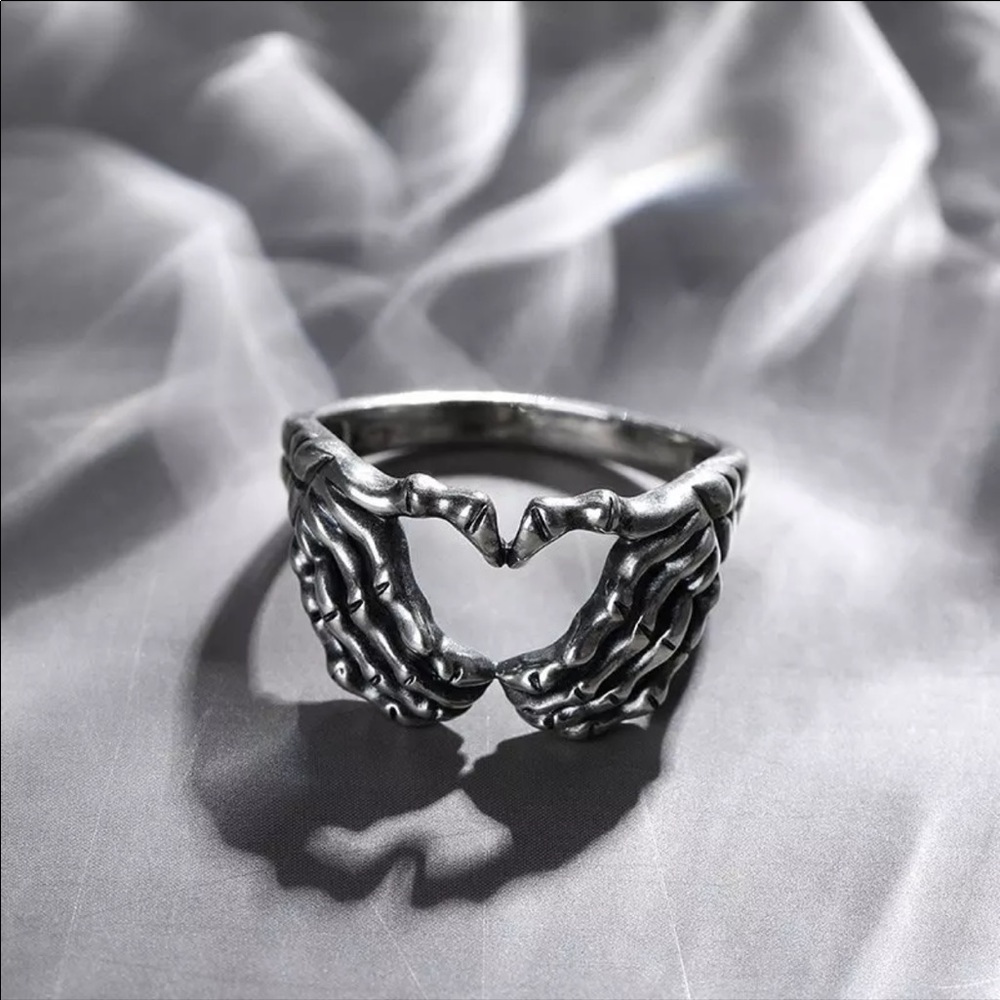 Skeleton heart ring